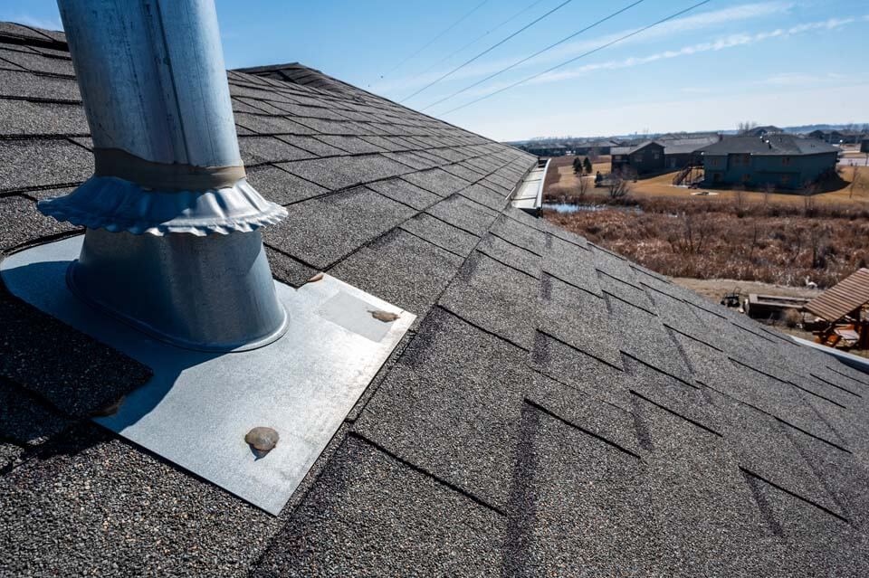 roof flashing around pipe vent on roof