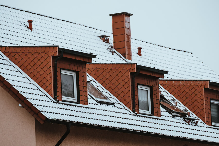 snow covered roof with material best suited for snow