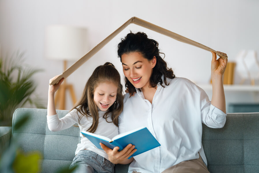 mother and daughter read unroof protected by insurance